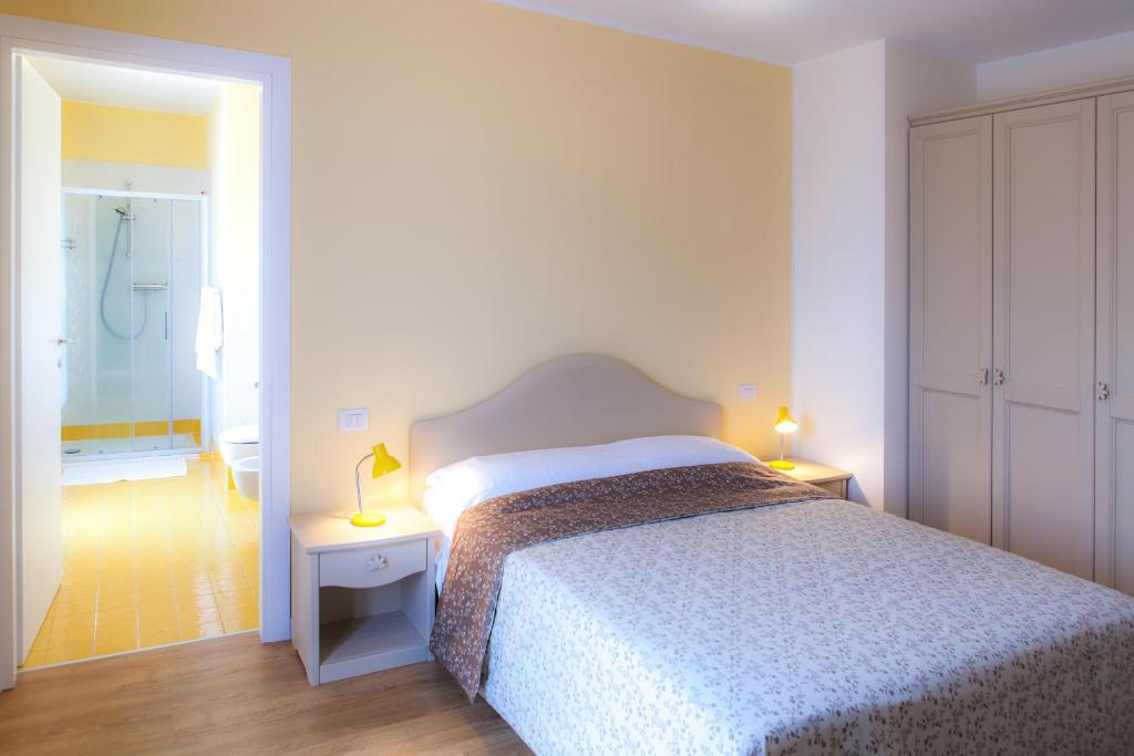 A bed or beds in a room at Agriturismo la Chiocciola