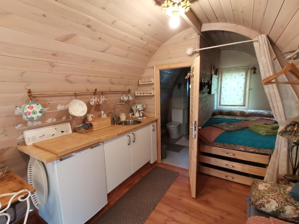 Kuchyň nebo kuchyňský kout v ubytování Tiny Cottage CASA UCCELLO
