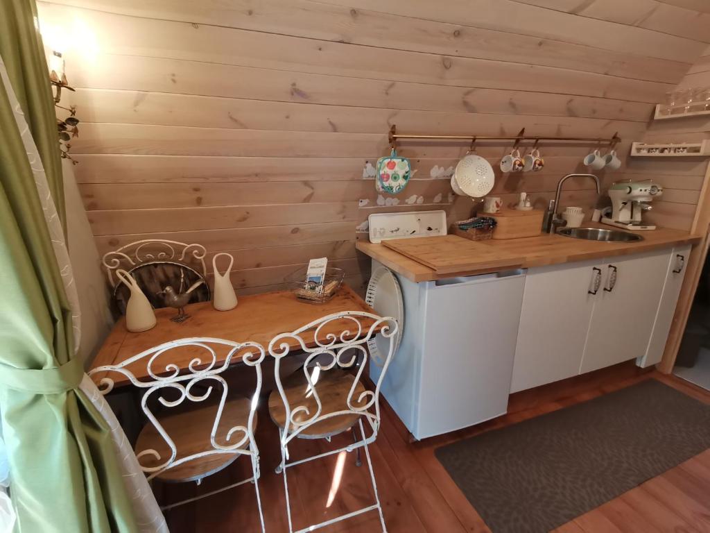 Kuchyň nebo kuchyňský kout v ubytování Tiny Cottage CASA UCCELLO