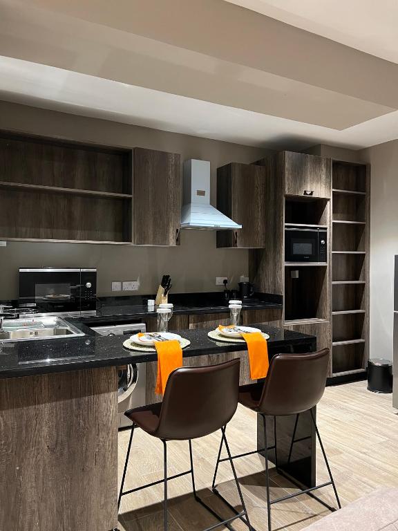 Kuchyň nebo kuchyňský kout v ubytování Sincerely Yours Suites & Serviced Apartments