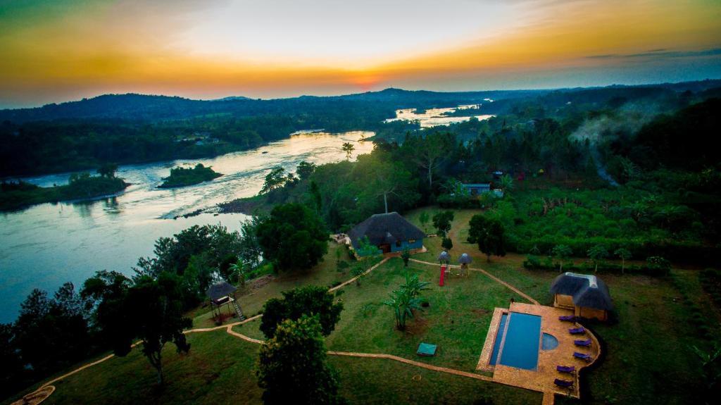 an aerial view of a house and a river at Buyala Bliss on the Nile in Jinja