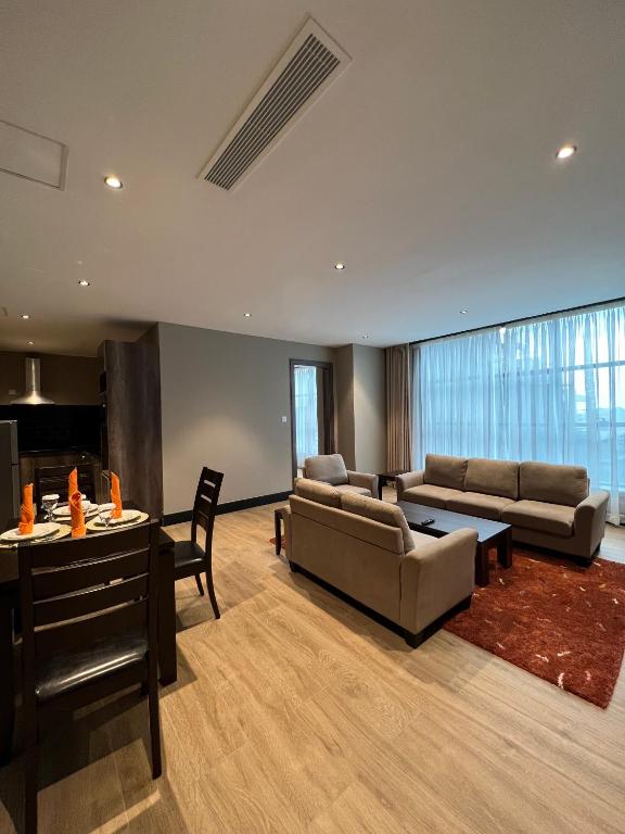 Posezení v ubytování Sincerely Yours Suites & Serviced Apartments