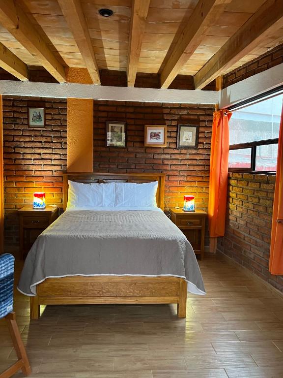 Postel nebo postele na pokoji v ubytování Casa Diez-59 Guanajuato Capital