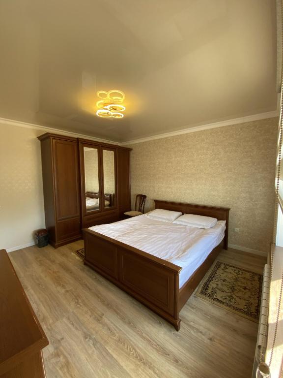 Postel nebo postele na pokoji v ubytování Guest House Tenir Too