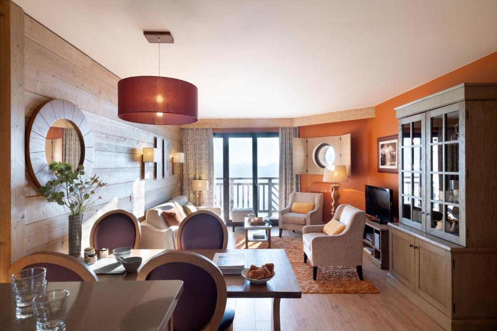 Posezení v ubytování Résidence Pierre & Vacances Premium L'Amara