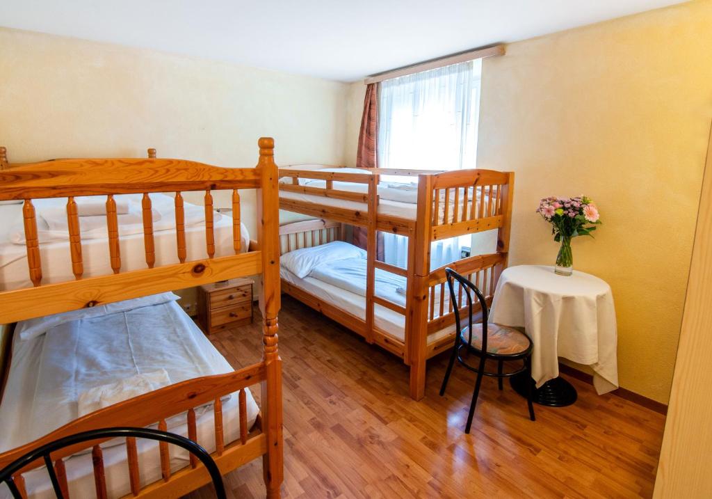 Postel nebo postele na pokoji v ubytování Rustico by Al Giardinetto