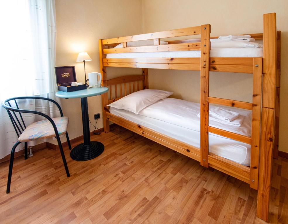 Postel nebo postele na pokoji v ubytování Rustico by Al Giardinetto