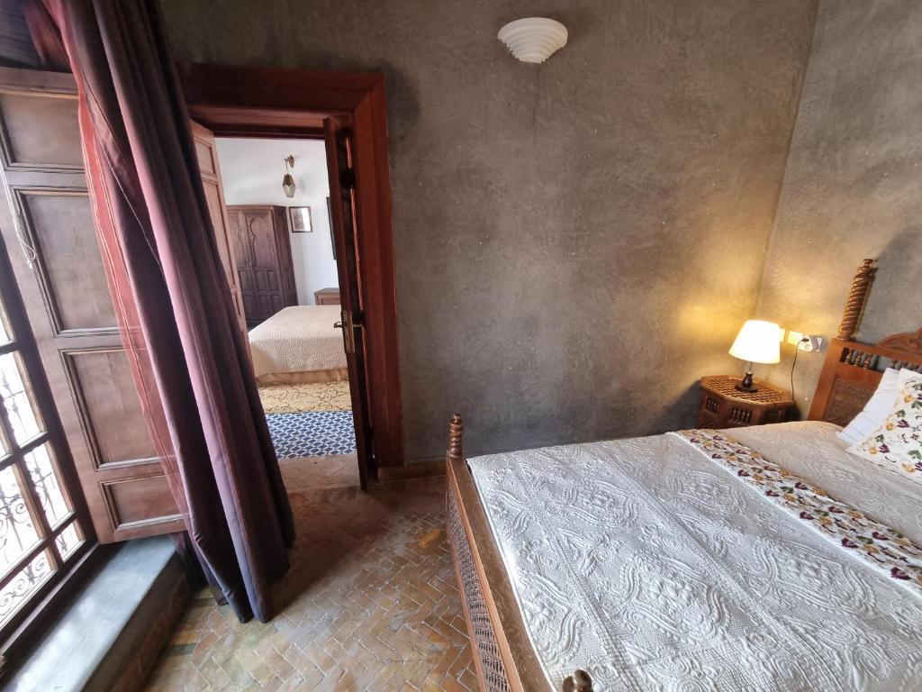 Postel nebo postele na pokoji v ubytování Riad Le Sucrier de Fès
