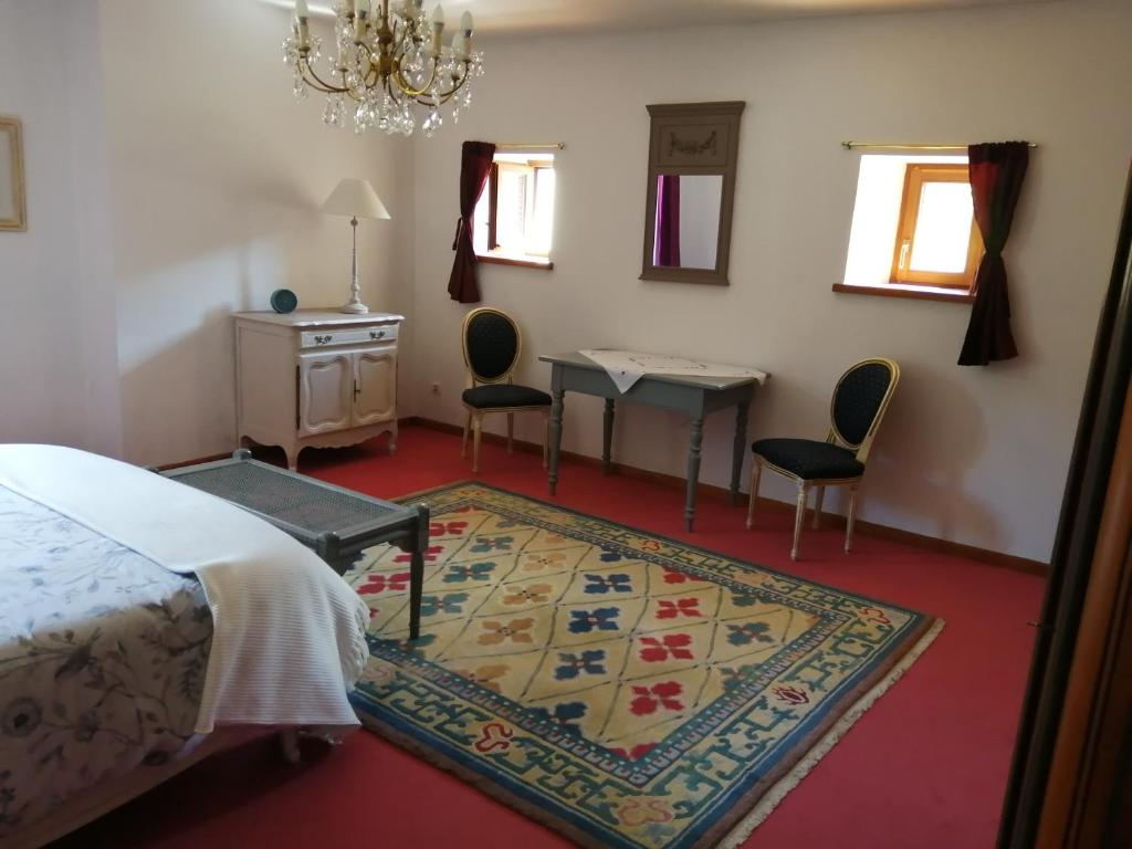 Postel nebo postele na pokoji v ubytování Le Breval