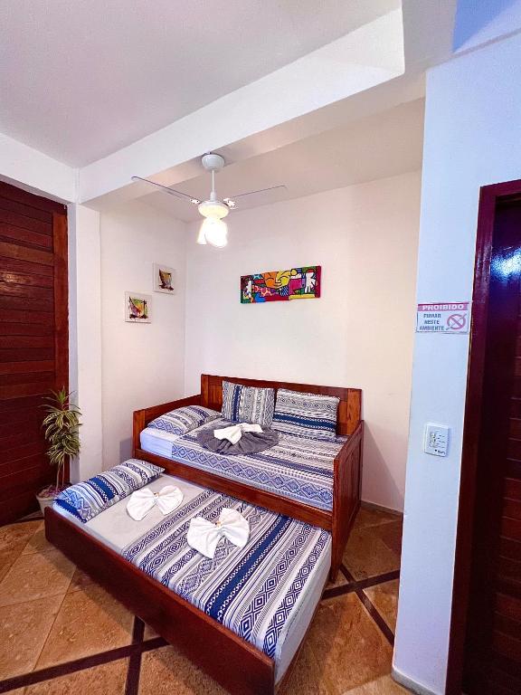 Postel nebo postele na pokoji v ubytování Residencial Bem-te-vi