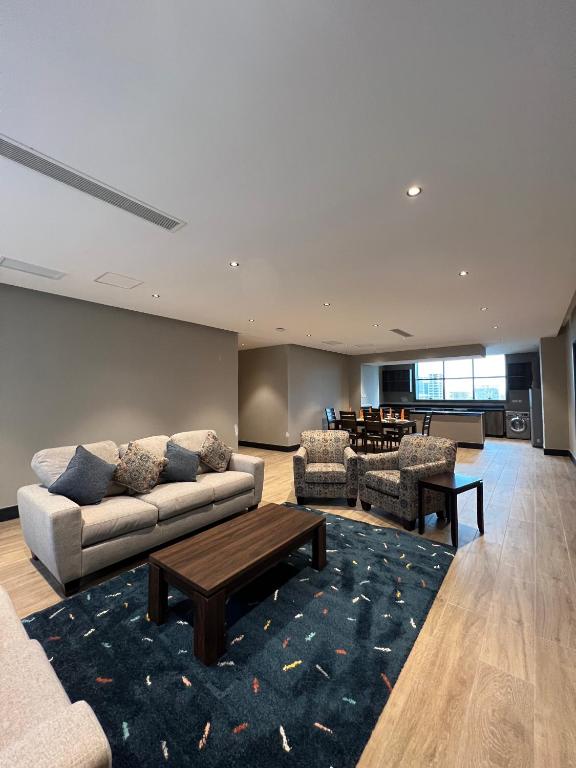 Posezení v ubytování Sincerely Yours Suites & Serviced Apartments