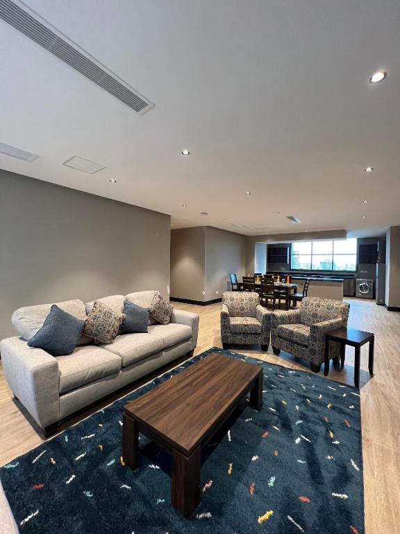 Posezení v ubytování Sincerely Yours Suites & Serviced Apartments