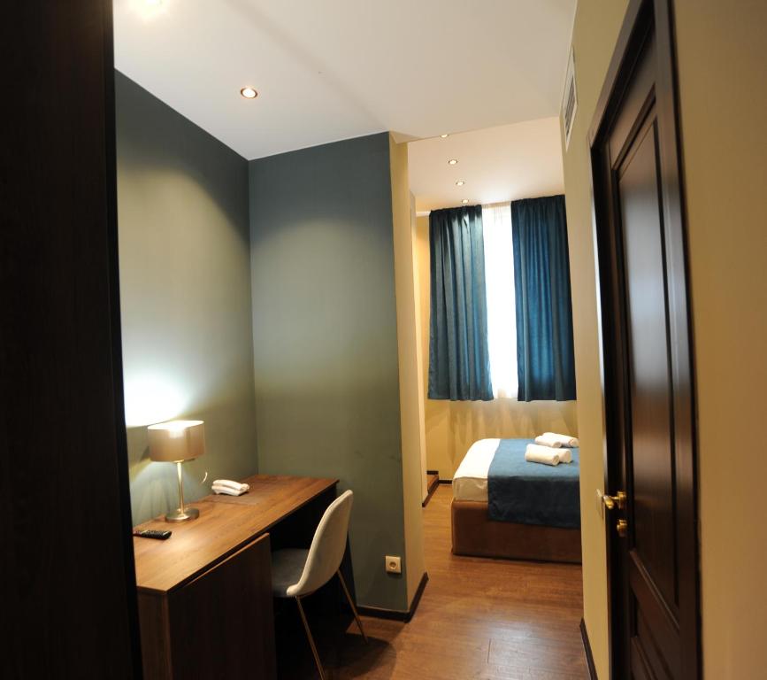 Postel nebo postele na pokoji v ubytování Hotel Verisima