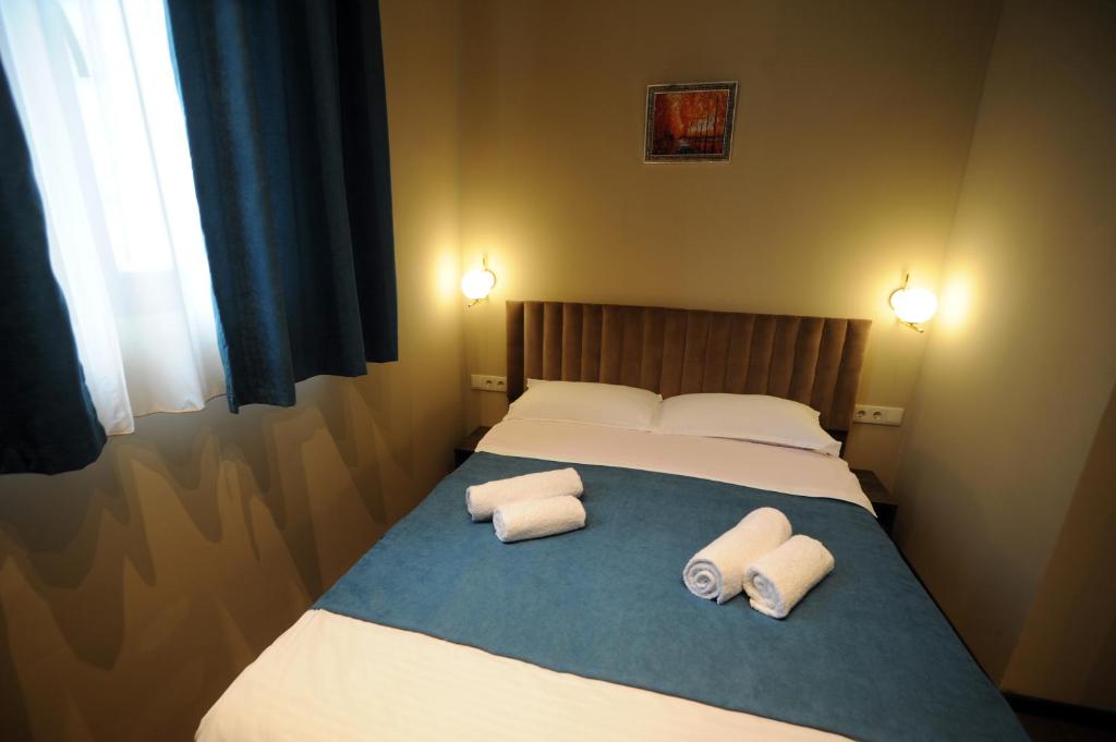 Postel nebo postele na pokoji v ubytování Hotel Verisima