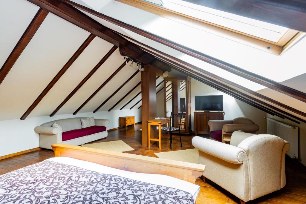 Postel nebo postele na pokoji v ubytování Hotel Turnul