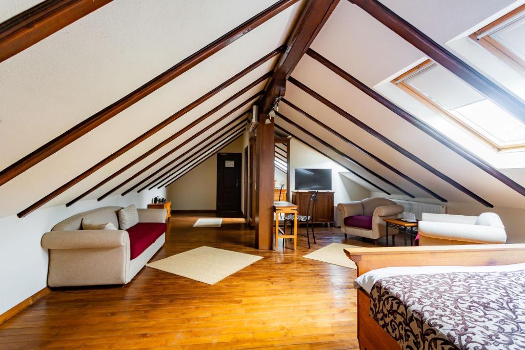 Postel nebo postele na pokoji v ubytování Hotel Turnul