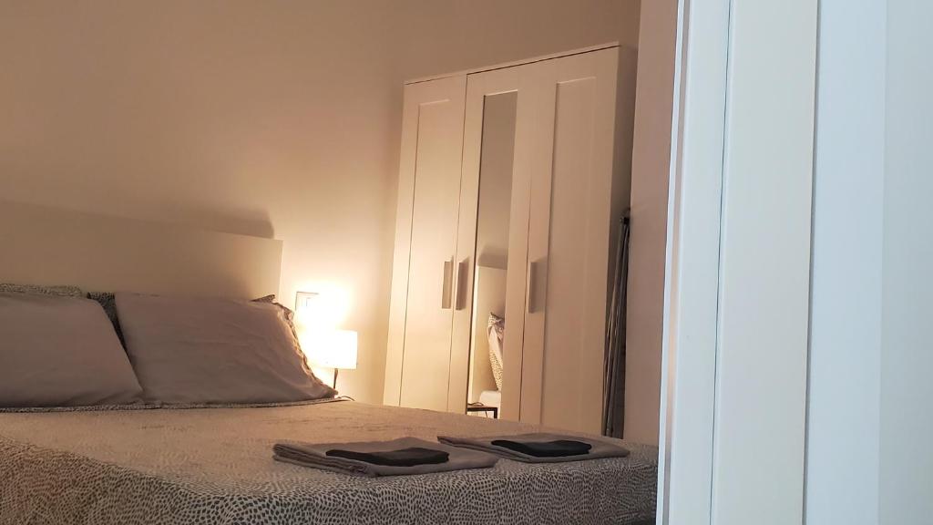 Posteľ alebo postele v izbe v ubytovaní B&B Lido Apartament 10A