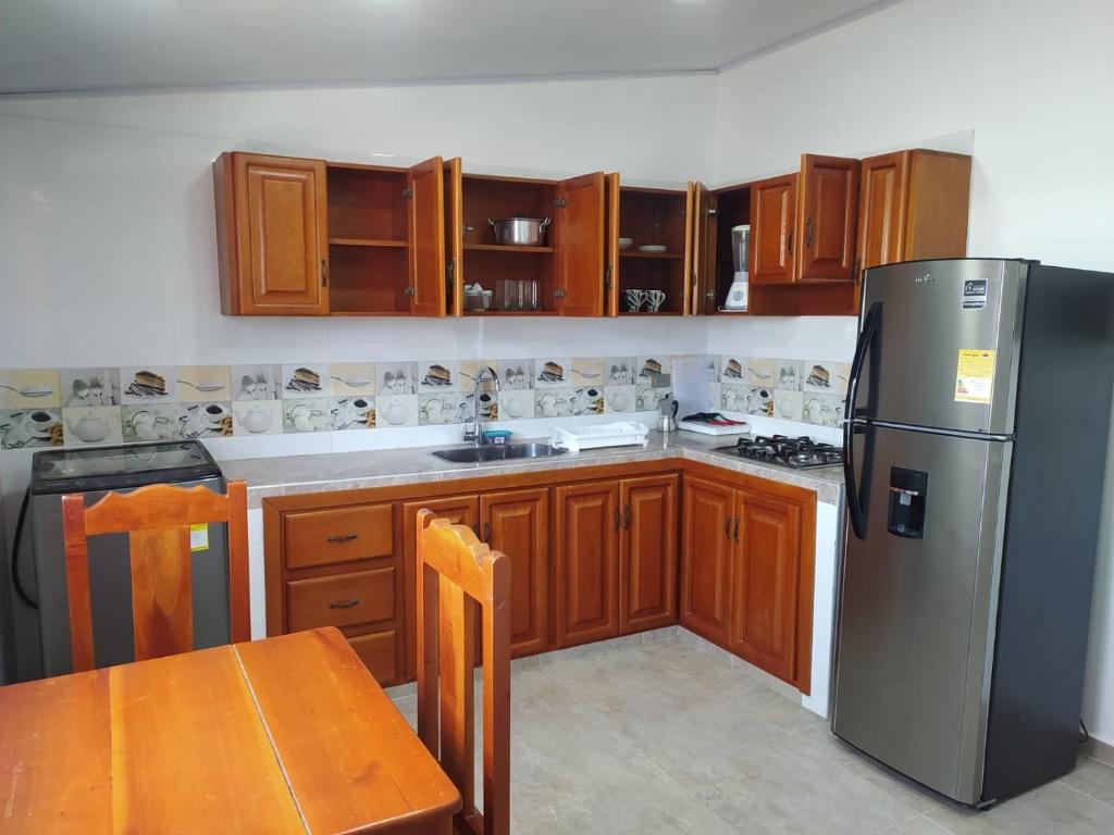 Kuchyň nebo kuchyňský kout v ubytování APARTAMENTOS DECOR