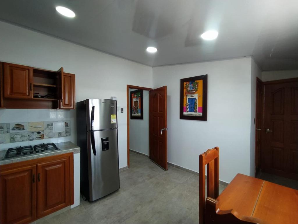 Kuchyň nebo kuchyňský kout v ubytování APARTAMENTOS DECOR