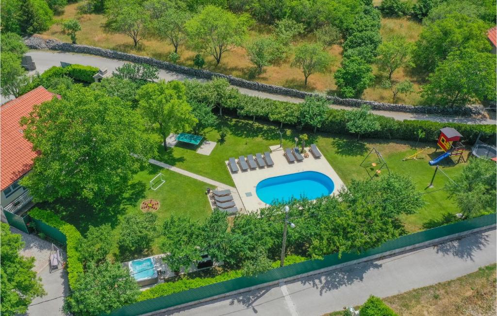 an overhead view of a garden with a swimming pool at Gorgeous Home In Imotski With Jacuzzi in Imotski