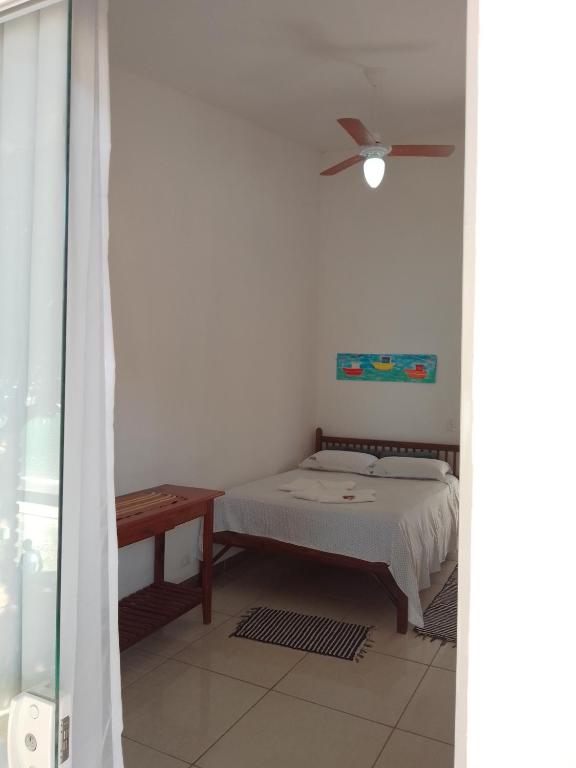 Postel nebo postele na pokoji v ubytování Pousada Pé na Areia