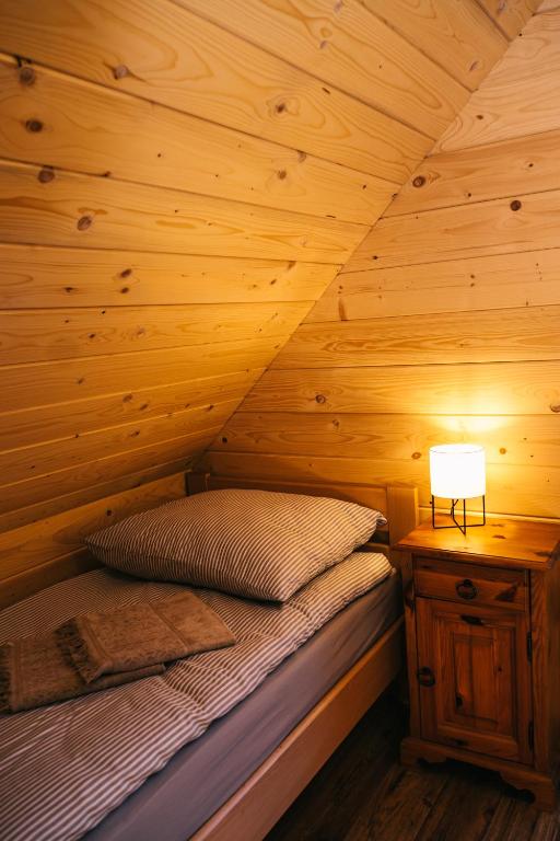 Postel nebo postele na pokoji v ubytování Chabrowa Chatka
