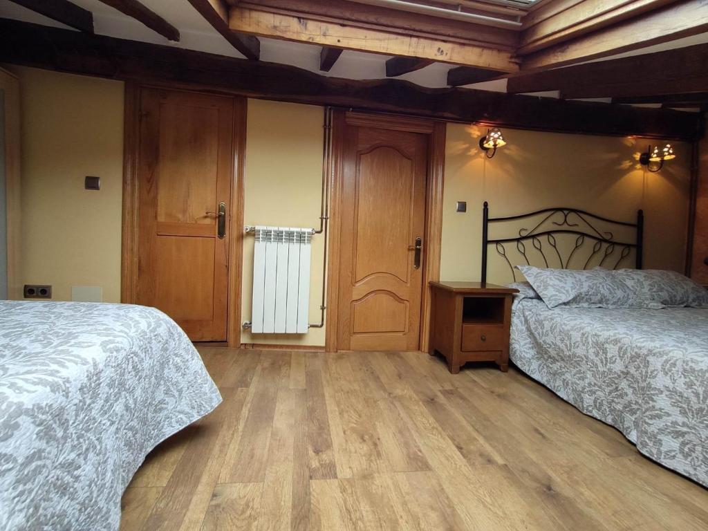 A bed or beds in a room at Casa Elvira
