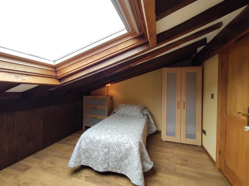 A bed or beds in a room at Casa Elvira