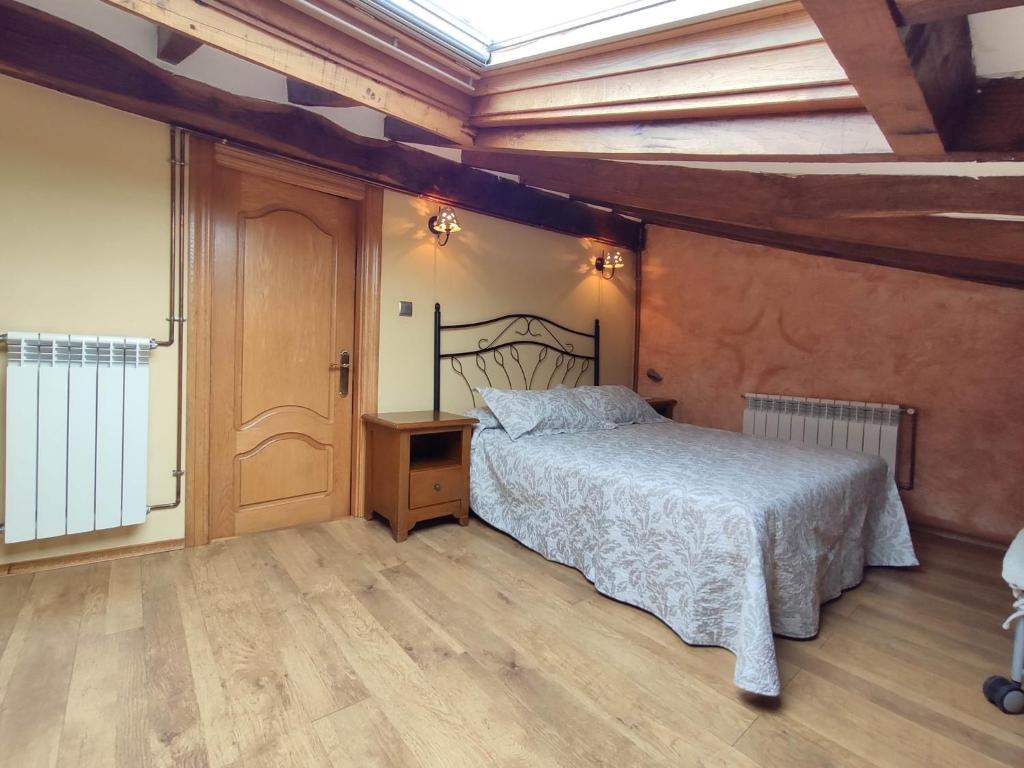 A bed or beds in a room at Casa Elvira
