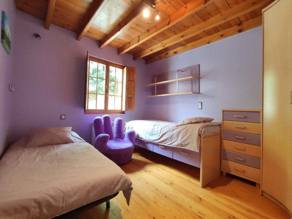 A bed or beds in a room at Casa Elvira