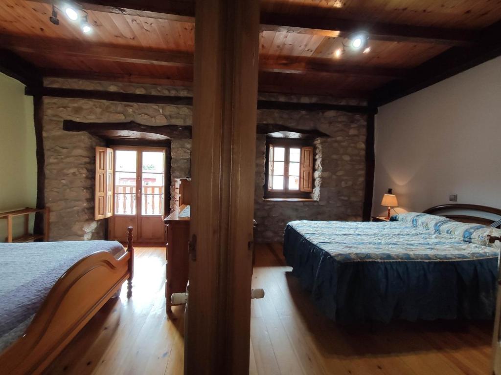 A bed or beds in a room at Casa Elvira