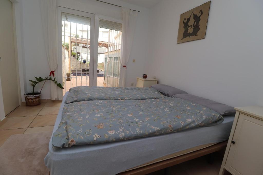 Postel nebo postele na pokoji v ubytování Casa Home Golf Playa