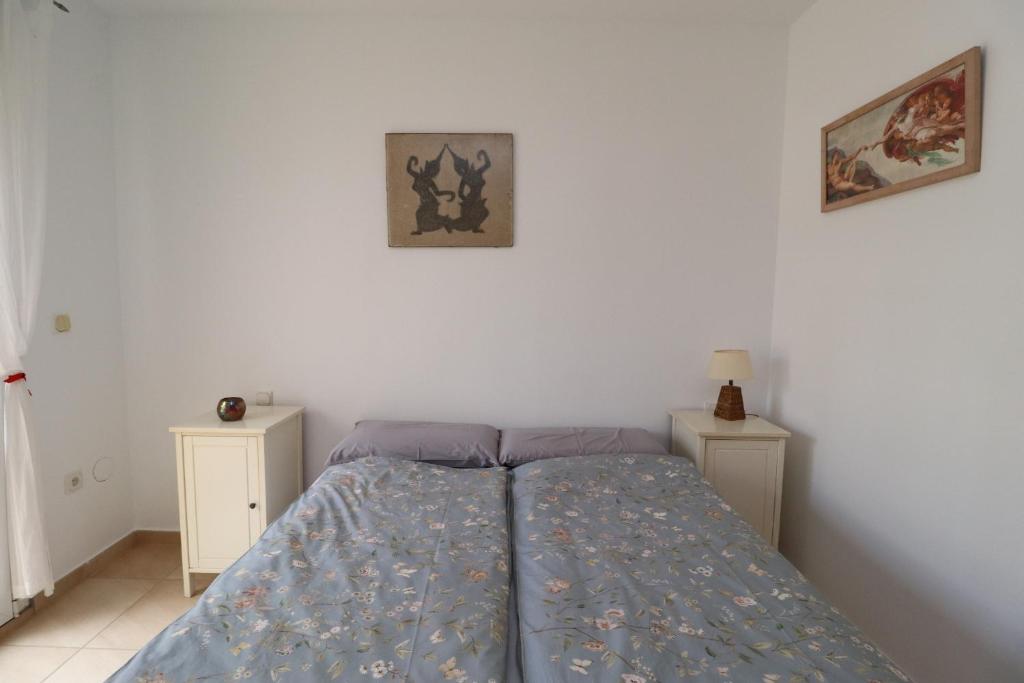 Postel nebo postele na pokoji v ubytování Casa Home Golf Playa