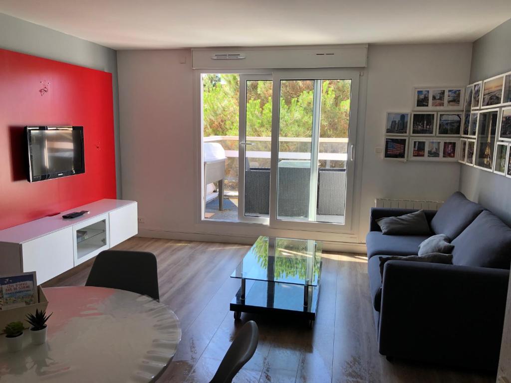 Appartement 3 Étoiles - Plage des Phoques avec Parking Privé - Appartement Met 2 Slaapkamers