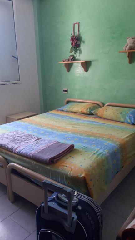 Posteľ alebo postele v izbe v ubytovaní Bella casa da Paola