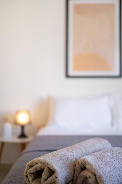 Postel nebo postele na pokoji v ubytování Mira Sitia Luxury Apartment