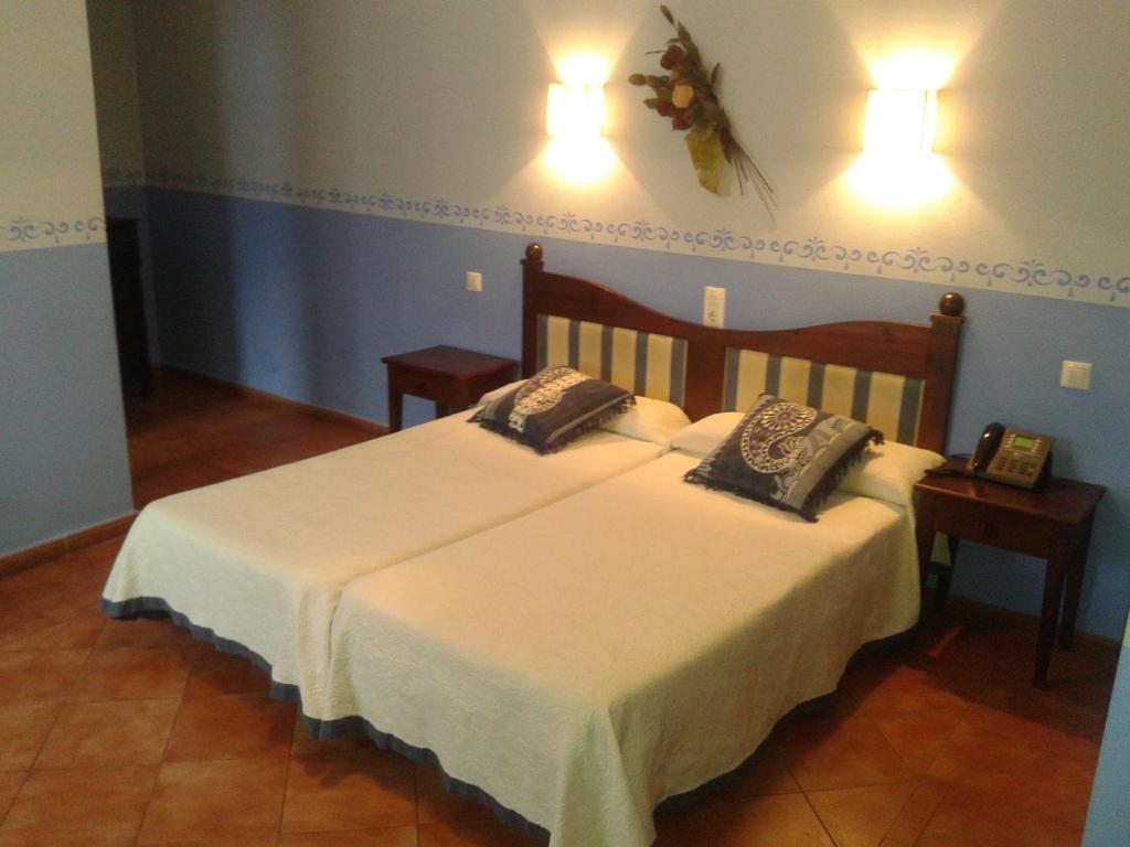 Llit o llits en una habitació de Hospederia Meson de la Dolores