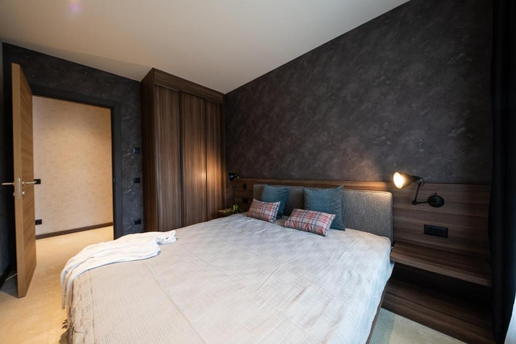 Postel nebo postele na pokoji v ubytování Aparthotel Woodside by Anaya