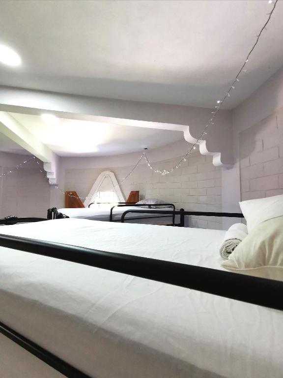 Postel nebo postele na pokoji v ubytování Mitico El Castillo