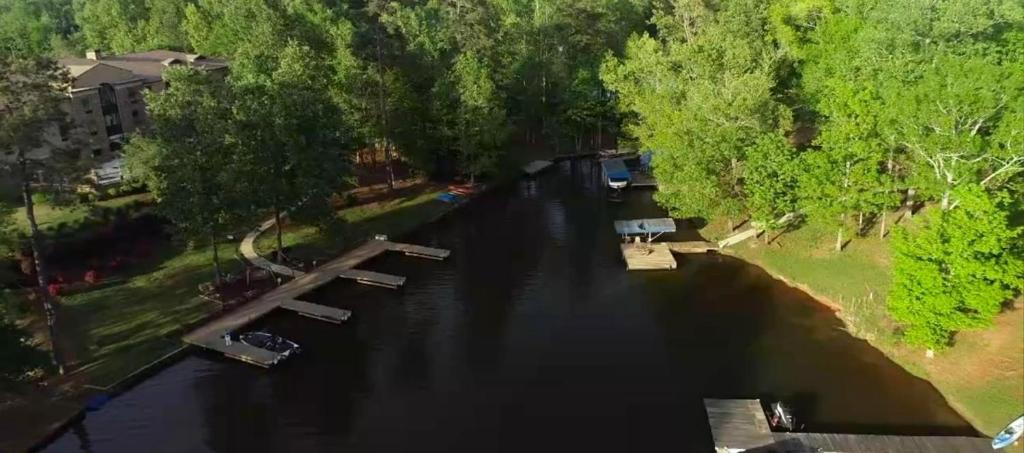 an aerial view of a river with boats in it at The Lodge on Lake Oconee in Eatonton 