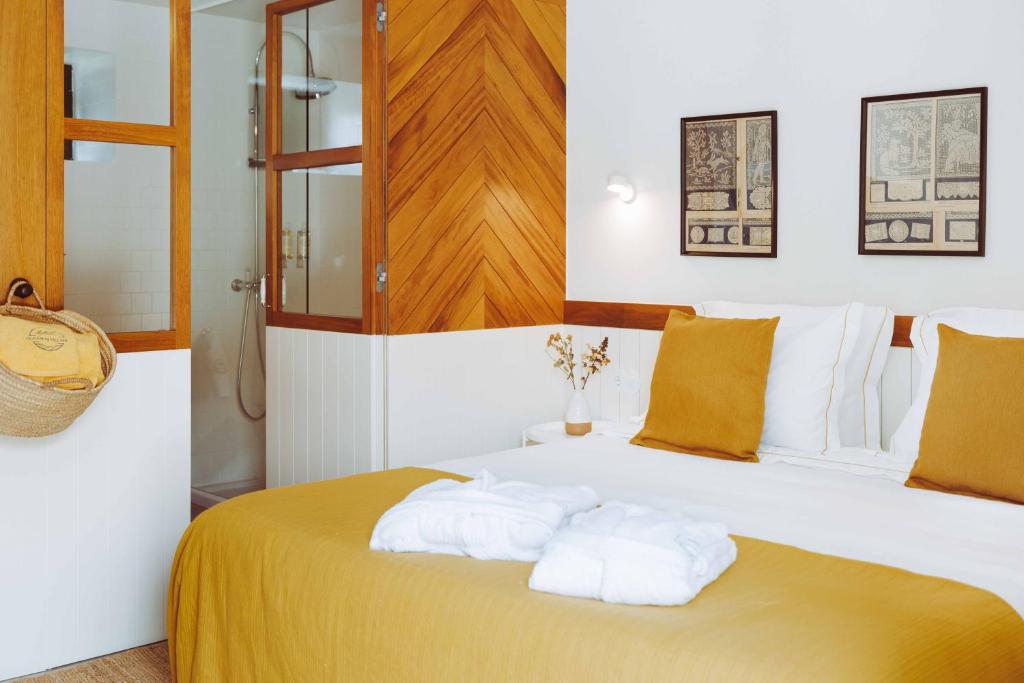 Uma cama ou camas num quarto em Oliveiras Village — Agroturismo