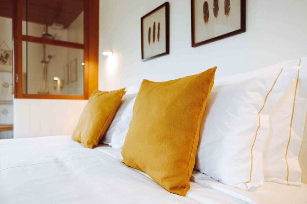Uma cama ou camas num quarto em Oliveiras Village — Agroturismo