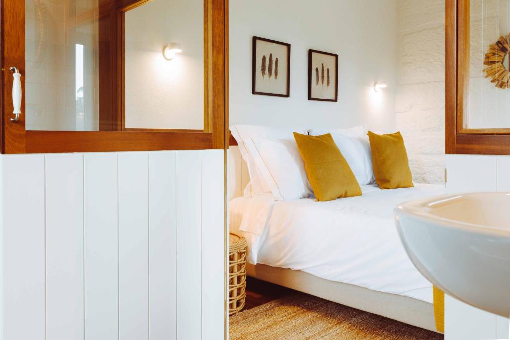 Uma cama ou camas num quarto em Oliveiras Village — Agroturismo