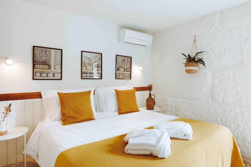 Uma cama ou camas num quarto em Oliveiras Village — Agroturismo