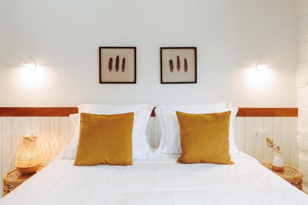 Uma cama ou camas num quarto em Oliveiras Village — Agroturismo