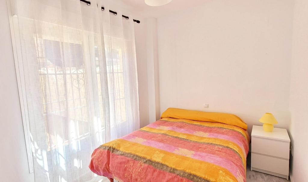 Postel nebo postele na pokoji v ubytování Casa Playa de Valdelagrana