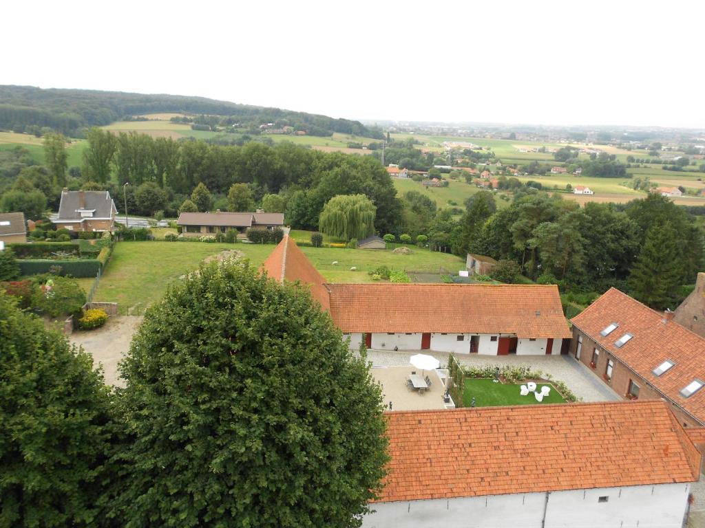 an aerial view of a house with a yard at B&B Hof ter Kwaremont in Kluisbergen