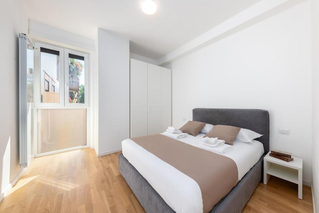 Posteľ alebo postele v izbe v ubytovaní Casa da Suite Centrale