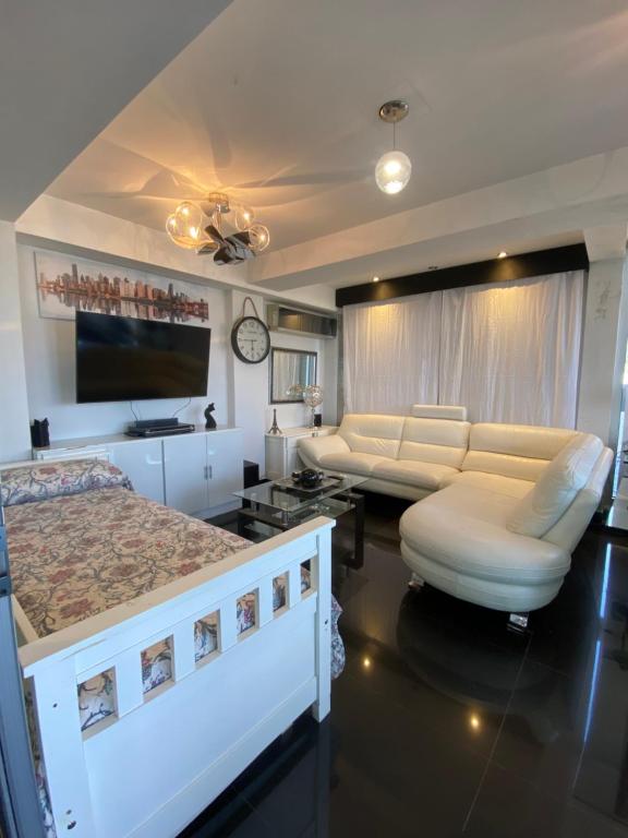 Khu vực ghế ngồi tại Departamento Penthouse en Salta Capital