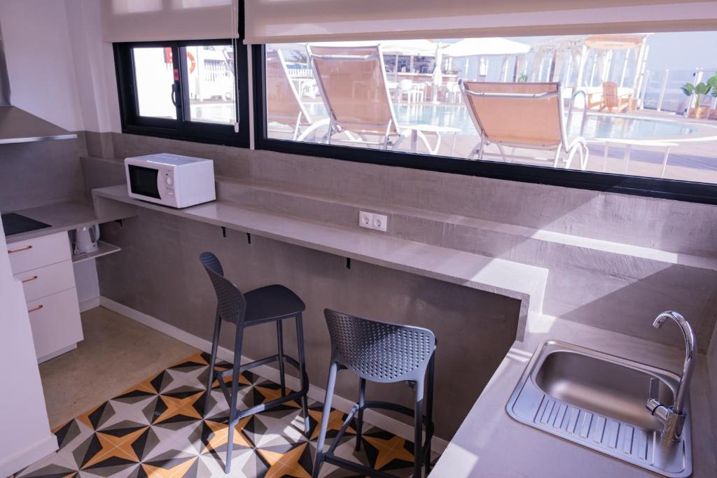 Kuchyň nebo kuchyňský kout v ubytování Apartamentos Punta Elena Beach